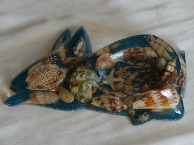shell disc art with cat art